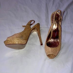 Gold platform heels ADRIANNA PAPELL